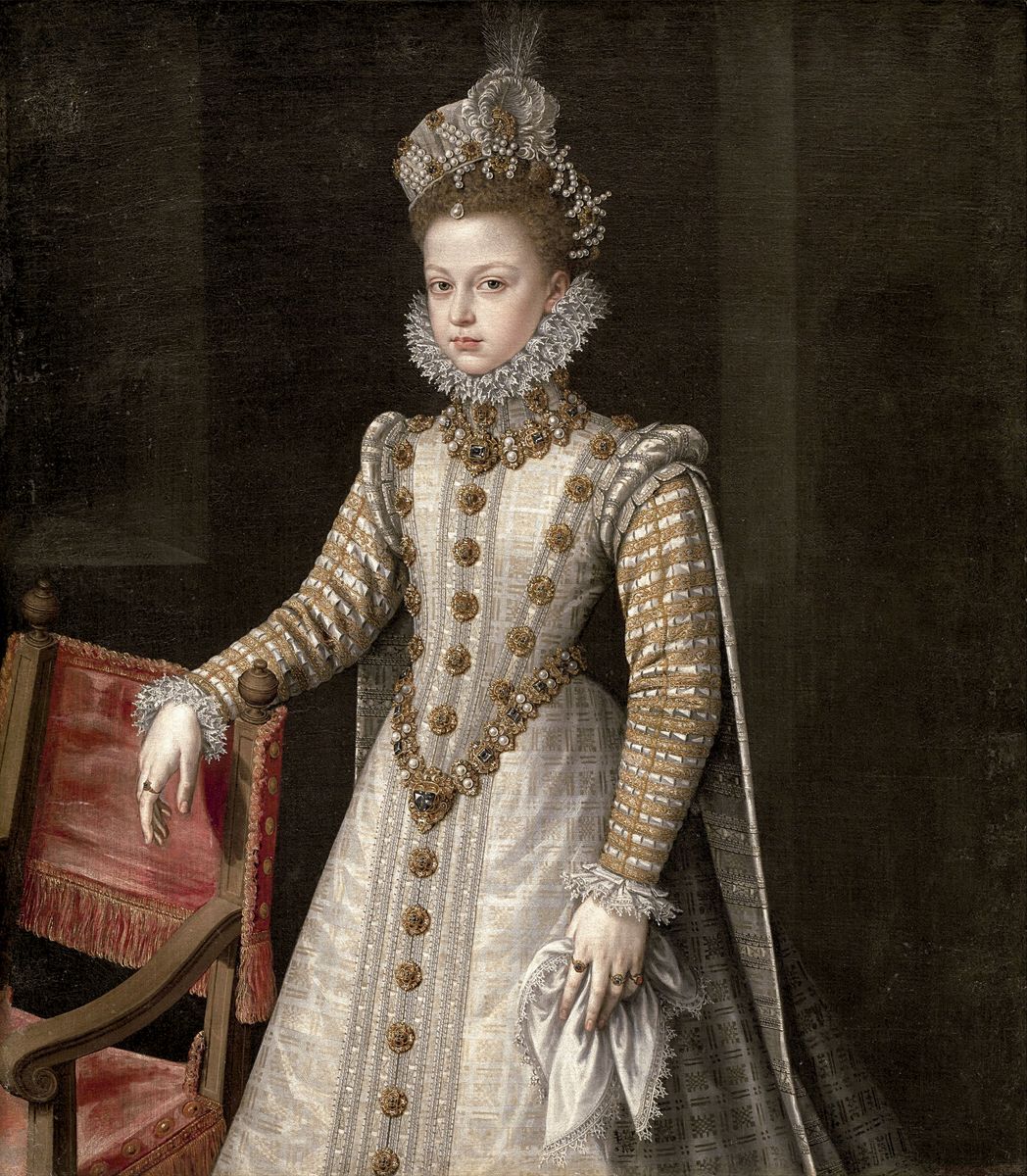 Peinture d'Alonso Sánchez Coello montrant l'infante Isabelle Claire Eugénie, très jeune, dans une somptueuse robe blanche ornée d'or, coiffée de perles et de plumes.